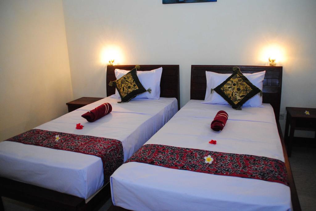 Jassri Homestay Пемутеран Номер фото